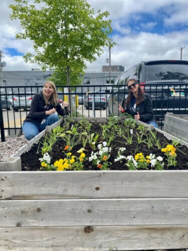 Klinic staff tend to the garden.